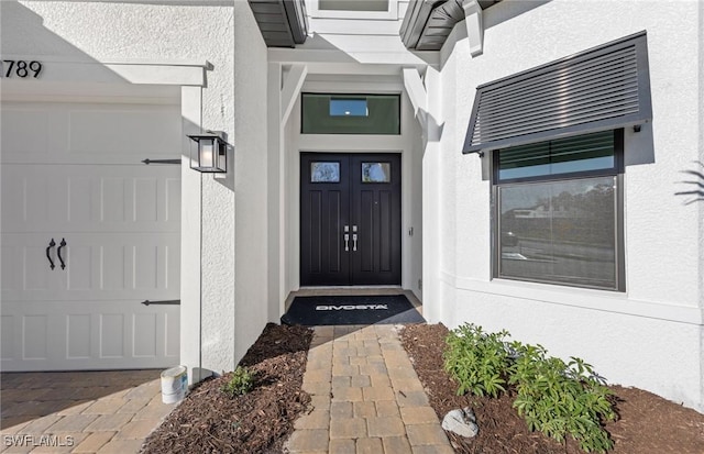 1825 Verada Ct, Naples, FL 34120 - view of exterior entry featuring stucco siding