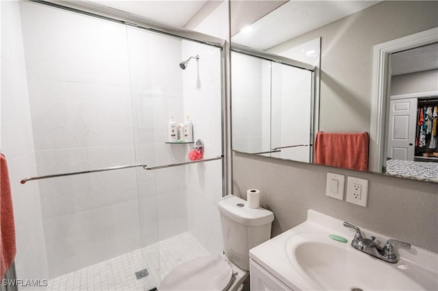 4924 20th Pl SW, Naples, FL 34116 - bathroom with a stall shower, vanity, and toilet