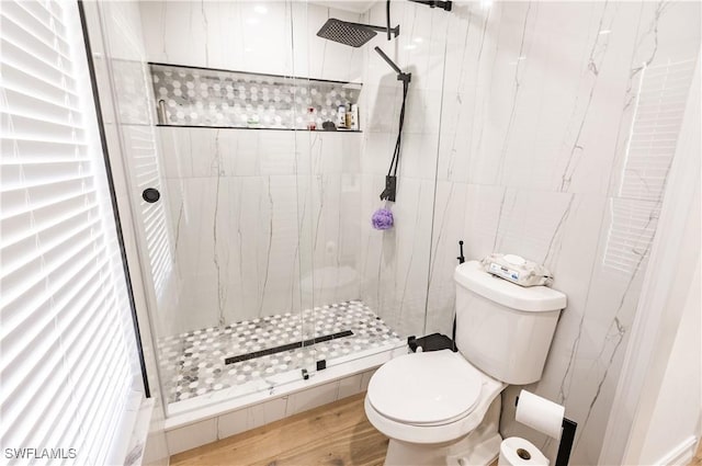 4924 20th Pl SW, Naples, FL 34116 - full bathroom with a shower stall, toilet, and wood finished floors