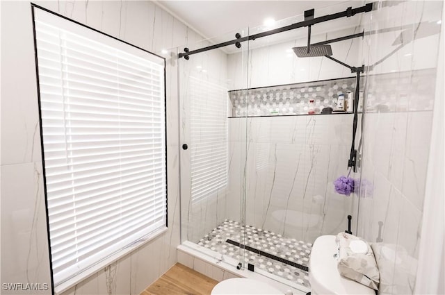 4924 20th Pl SW, Naples, FL 34116 - bathroom featuring toilet, a shower stall, and wood finished floors