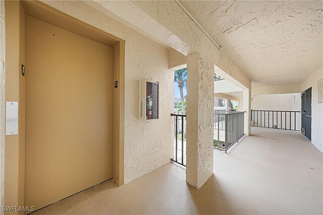 2 Pirates Ln Unit 24B, Punta Gorda, FL 33955 - corridor featuring elevator