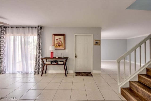 1464 Park Shore Cir Unit 2, Fort Myers, FL 33901 - foyer entrance featuring light tile patterned floors, stairway, and baseboards