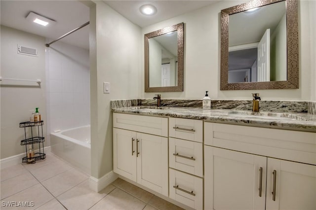 1464 Park Shore Cir Unit 2, Fort Myers, FL 33901 - full bath featuring baseboards, double vanity, tile patterned flooring, and shower / bathtub combination