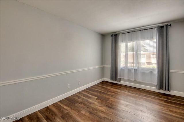 1464 Park Shore Cir Unit 2, Fort Myers, FL 33901 - spare room with dark wood finished floors and baseboards