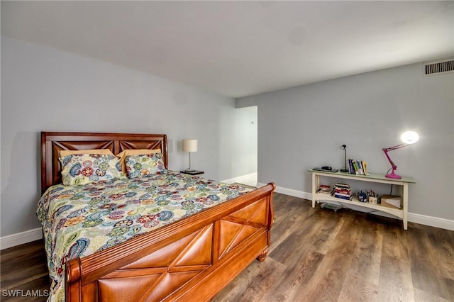 1464 Park Shore Cir Unit 2, Fort Myers, FL 33901 - bedroom with dark wood-type flooring and baseboards