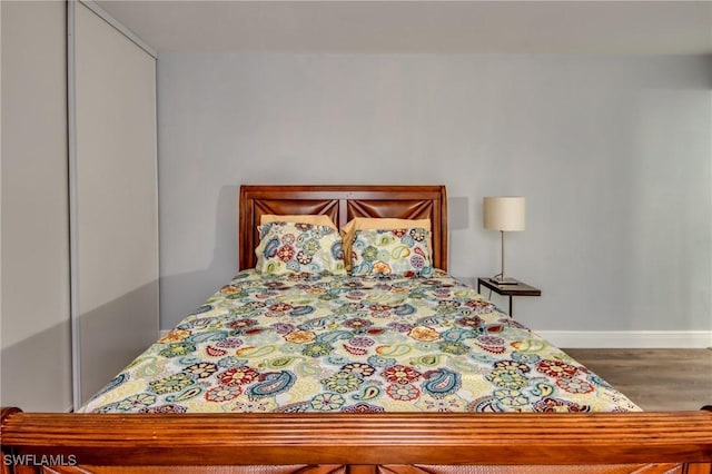 1464 Park Shore Cir Unit 2, Fort Myers, FL 33901 - bedroom featuring wood finished floors and baseboards