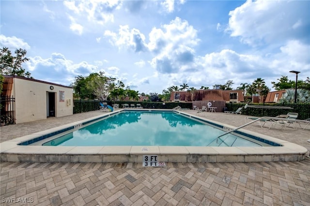 1464 Park Shore Cir Unit 2, Fort Myers, FL 33901 - community pool featuring a patio