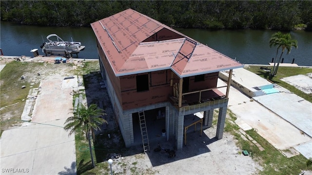 99 Blackbeard Way, Fort Myers Beach, FL 33931 - dock area with a water view and a view of trees