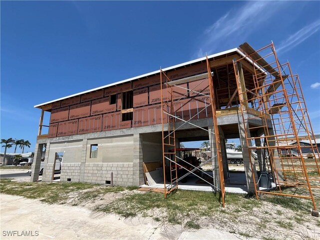 99 Blackbeard Way, Fort Myers Beach, FL 33931 - view of outbuilding with stairs