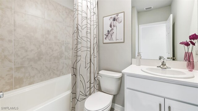 2709 19th St SW, Lehigh Acres, FL 33976 - full bath featuring vanity, toilet, and shower / bath combination with curtain