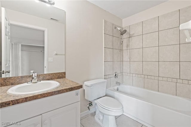 209 Meadow Rd, Lehigh Acres, FL 33973 - bathroom featuring vanity, toilet, tub / shower combination, and tile patterned flooring