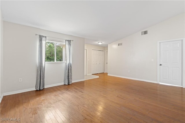 209 Meadow Rd, Lehigh Acres, FL 33973 - unfurnished room with wood-type flooring and baseboards