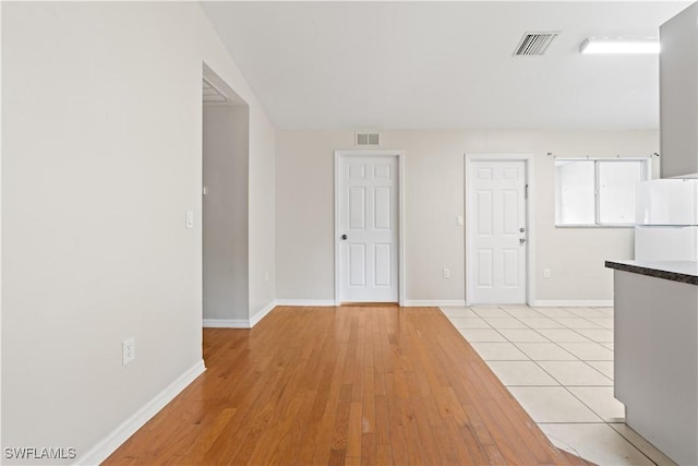 209 Meadow Rd, Lehigh Acres, FL 33973 - spare room with light wood finished floors and baseboards