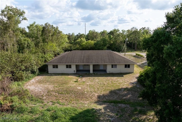 209 Meadow Rd, Lehigh Acres, FL 33973 - view of rear view of house