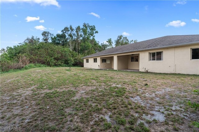 209 Meadow Rd, Lehigh Acres, FL 33973 - view of grassy yard