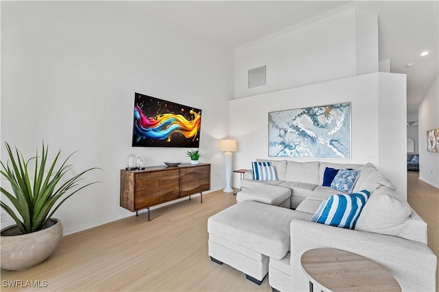 20051 Seagrove St Unit 1206, Estero, FL 33928 - living area with light wood-style flooring and a high ceiling
