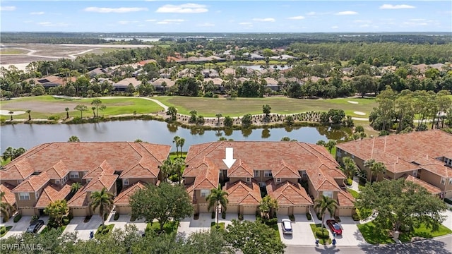 20051 Seagrove St Unit 1206, Estero, FL 33928 - aerial perspective of suburban area featuring a golf course and a nearby body of water