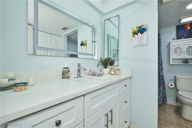 1051 Palm Ave Unit 117, North Fort Myers, FL 33903 - full bath featuring vanity, toilet, and baseboards