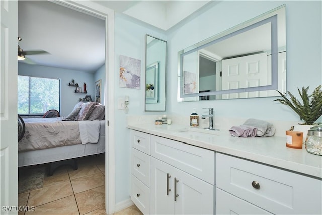 1051 Palm Ave Unit 117, North Fort Myers, FL 33903 - bathroom with vanity, ensuite bathroom, ceiling fan, and tile patterned floors