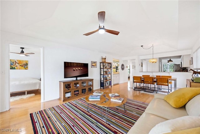 4241 Chantelle Dr Unit D201, Naples, FL 34112 - living area featuring a ceiling fan and light wood-style floors