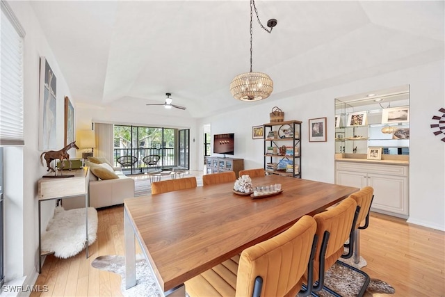 4241 Chantelle Dr Unit D201, Naples, FL 34112 - dining area with ceiling fan, light wood-type flooring, and a chandelier