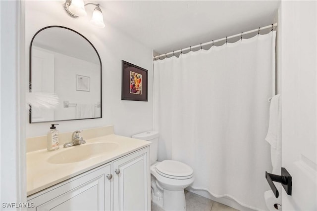 4241 Chantelle Dr Unit D201, Naples, FL 34112 - full bathroom with toilet, vanity, tile patterned flooring, and curtained shower