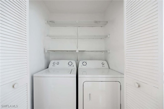 4241 Chantelle Dr Unit D201, Naples, FL 34112 - laundry area featuring washing machine and clothes dryer