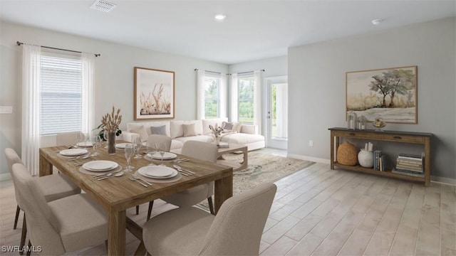 4135 Peaceful River Ln, Fort Myers, FL 33905 - dining space with healthy amount of natural light, baseboards, light wood finished floors, and recessed lighting