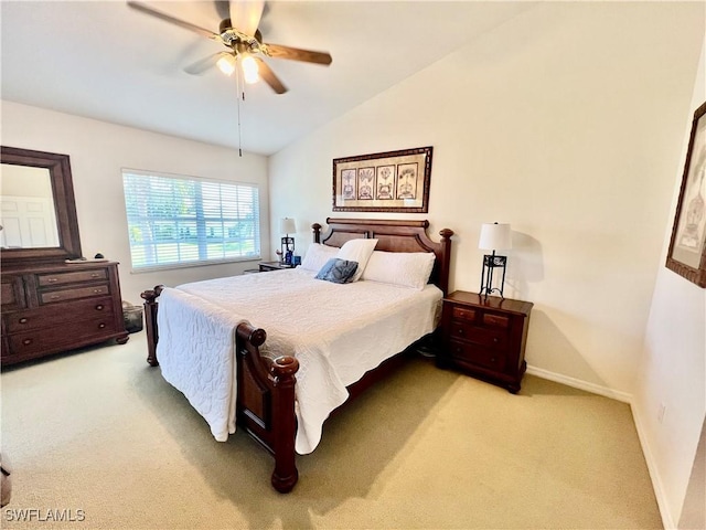 19915 Lake Vista Cir Unit 15C, Lehigh Acres, FL 33936 - carpeted bedroom with lofted ceiling, baseboards, and a ceiling fan