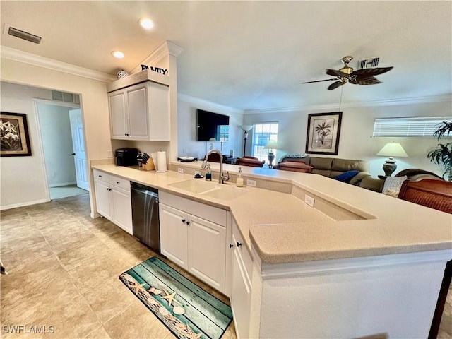 19915 Lake Vista Cir Unit 15C, Lehigh Acres, FL 33936 - kitchen featuring a sink, dishwashing machine, open floor plan, ornamental molding, and a peninsula