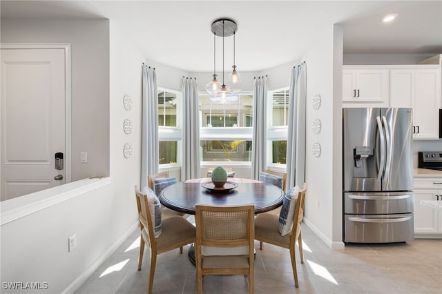 4665 Arboretum Cir Unit 101, Naples, FL 34112 - dining room with baseboards and recessed lighting