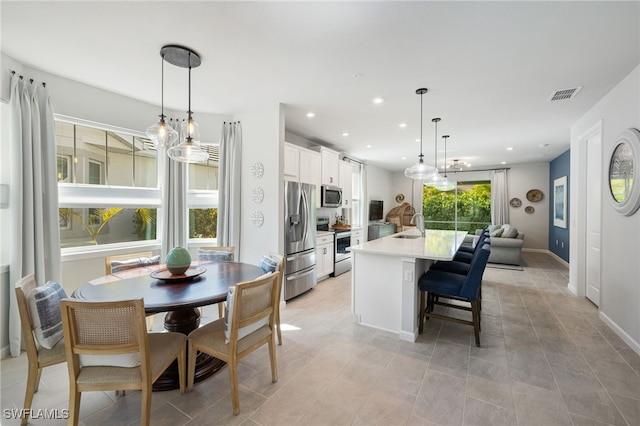 4665 Arboretum Cir Unit 101, Naples, FL 34112 - dining area featuring recessed lighting and baseboards