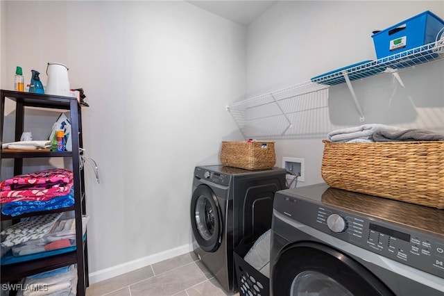 4665 Arboretum Cir Unit 101, Naples, FL 34112 - laundry area with separate washer and dryer, tile patterned floors, and baseboards