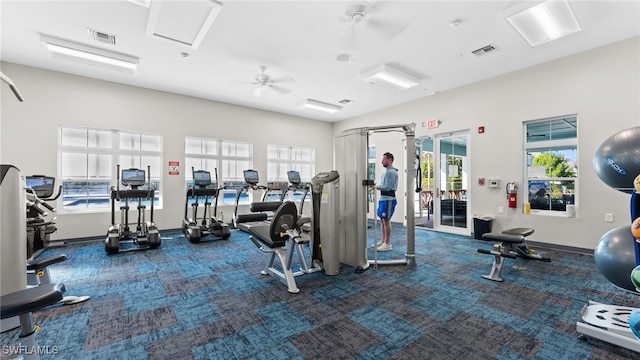 4665 Arboretum Cir Unit 101, Naples, FL 34112 - exercise room featuring carpet flooring, baseboards, and ceiling fan