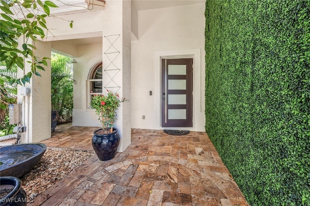 786 109th Ave N, Naples, FL 34108 - entrance to property featuring stucco siding