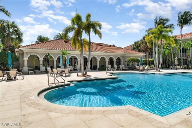 8570 Evernia Ct Unit 101, Estero, FL 34135 - community pool with a patio area