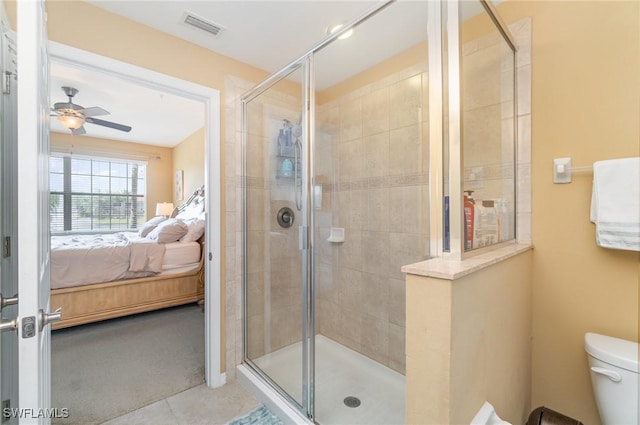 8570 Evernia Ct Unit 101, Estero, FL 34135 - full bath featuring ensuite bath, a shower stall, ceiling fan, and toilet