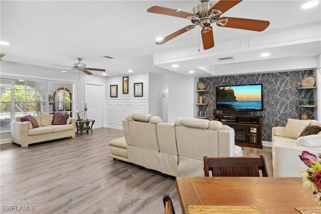 3500 Liberty St, Port Charlotte, FL 33948 - living area with ceiling fan, recessed lighting, wood finished floors, and baseboards