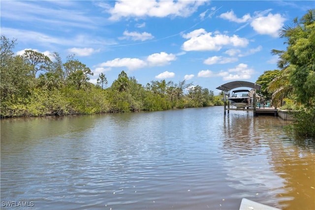 3500 Liberty St, Port Charlotte, FL 33948 - dock featuring a water view and boat lift