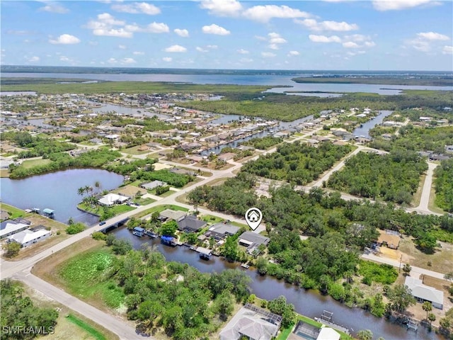 3500 Liberty St, Port Charlotte, FL 33948 - aerial perspective of suburban area featuring a large body of water