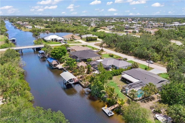 3500 Liberty St, Port Charlotte, FL 33948 - aerial perspective of suburban area featuring a large body of water