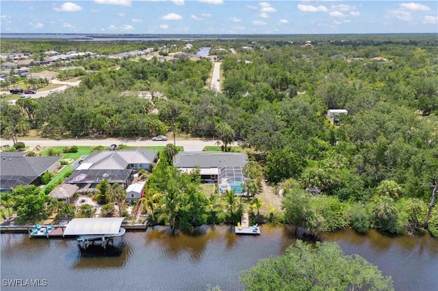 3500 Liberty St, Port Charlotte, FL 33948 - aerial view of residential area featuring a nearby body of water and a forest