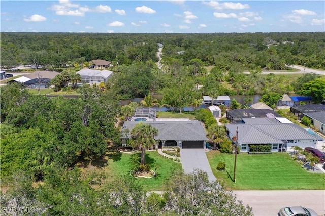 3500 Liberty St, Port Charlotte, FL 33948 - aerial view of residential area with a heavily wooded area