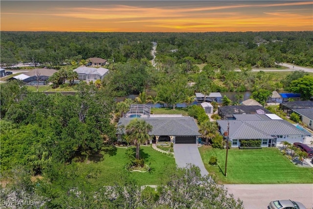 3500 Liberty St, Port Charlotte, FL 33948 - aerial perspective of suburban area with a heavily wooded area