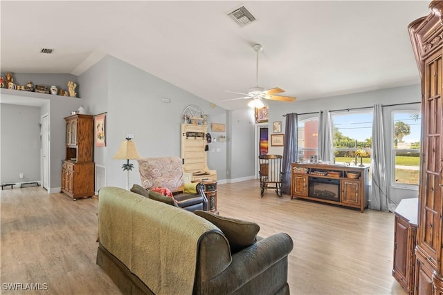 923 SW 4th Pl, Cape Coral, FL 33991 - living room featuring light wood-style floors, a ceiling fan, lofted ceiling, and baseboards