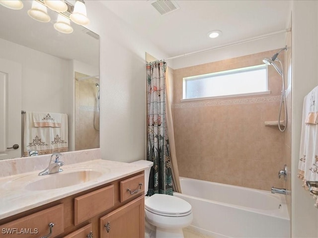 15137 Cortona Way, Naples, FL 34120 - bathroom featuring vanity, toilet, shower / tub combo with curtain, and a chandelier