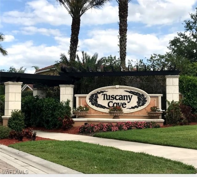 15137 Cortona Way, Naples, FL 34120 - community sign with a lawn