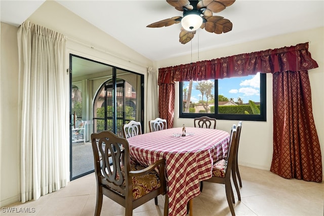 27771 Hacienda E Blvd Unit 223A, Bonita Springs, FL 34135 - dining area featuring lofted ceiling, light tile patterned floors, and ceiling fan
