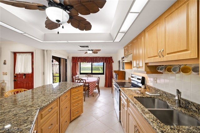 27771 Hacienda E Blvd Unit 223A, Bonita Springs, FL 34135 - kitchen featuring stainless steel electric stove, a sink, a raised ceiling, and ceiling fan