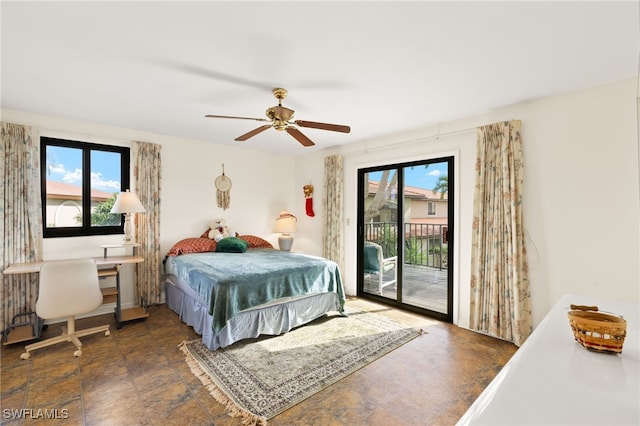27771 Hacienda E Blvd Unit 223A, Bonita Springs, FL 34135 - bedroom featuring access to exterior, multiple windows, stone finish floors, and ceiling fan